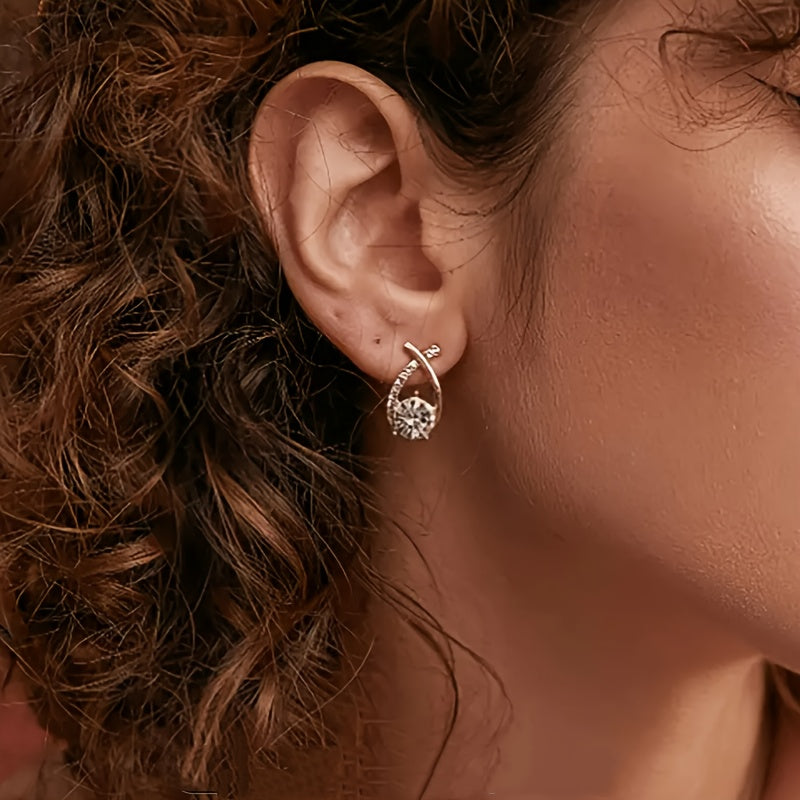 Boucles d'oreilles en puce avec croix dorée et zirconiums