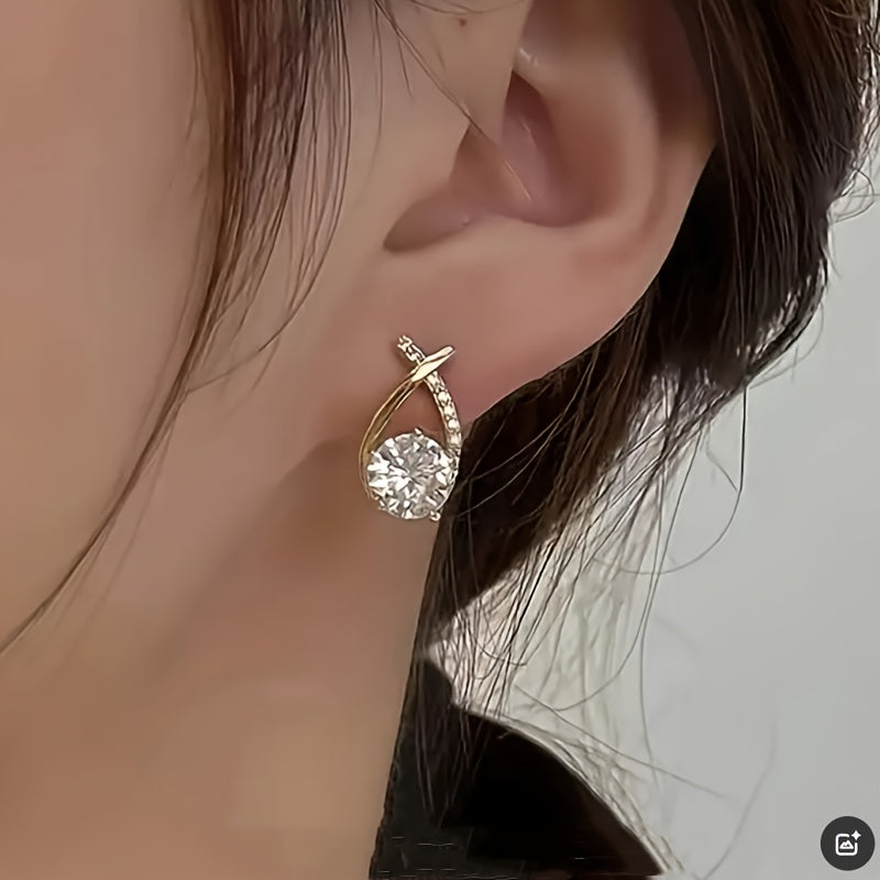 Boucles d'oreilles en puce avec croix dorée et zirconiums